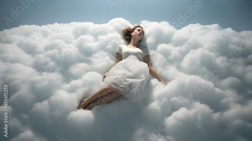 femme qui dort sur un nuage qui flotte dans les airs photo