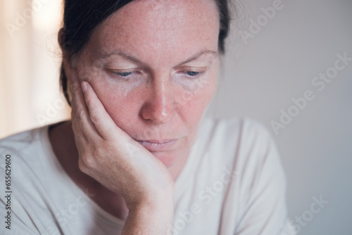 Canvas Print Regret and remorse, portrait of adult caucasian female