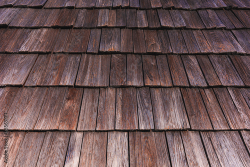 Worn wooden roof tile pattern, detail of a typical old slovenian alpine cottage roofing