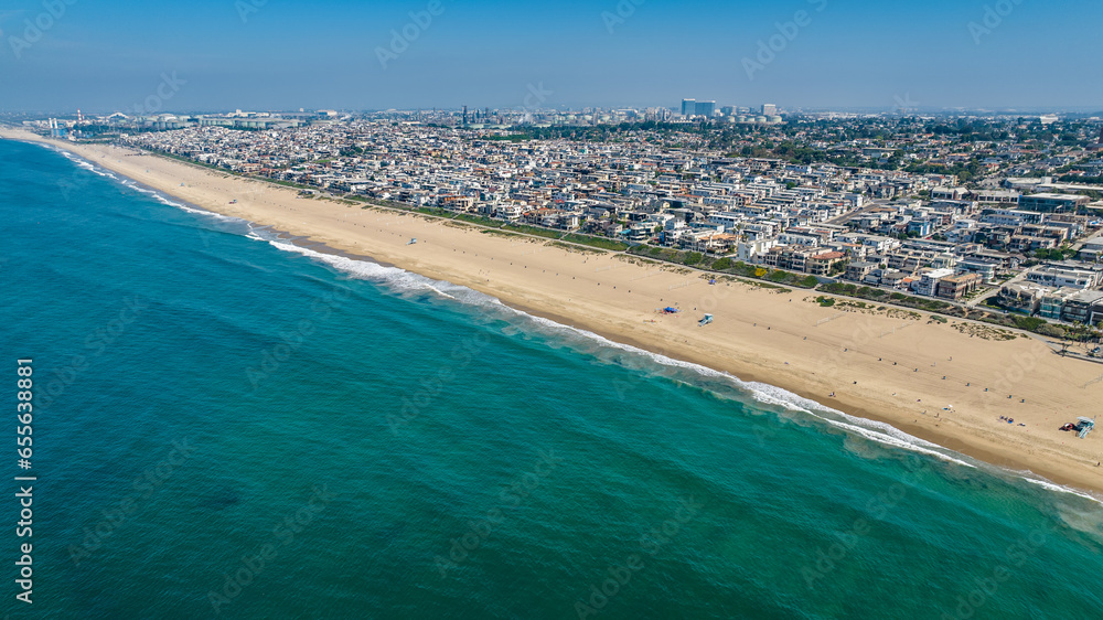 Manhattan Beach, Los Angeles, California, USA - 23-10-1, aerial landscape view of Manhattan Beach at South Bay with people walking on the beach