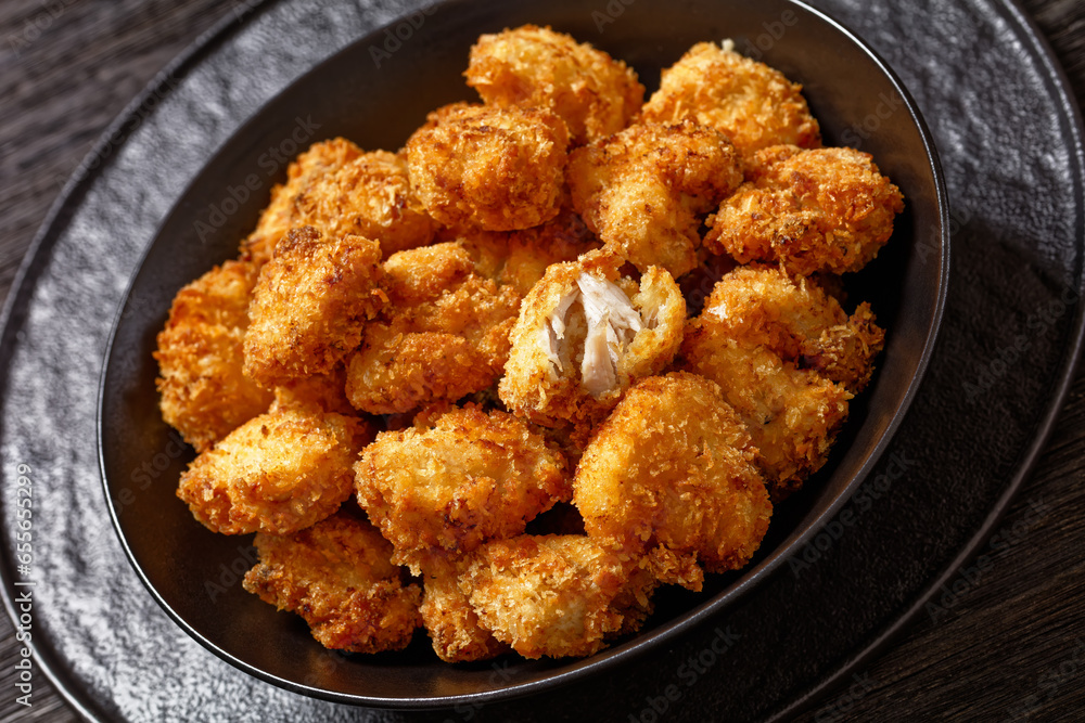 crispy fried panko breaded chicken bites in bowl crispy fried panko breaded chicken bites in bowl