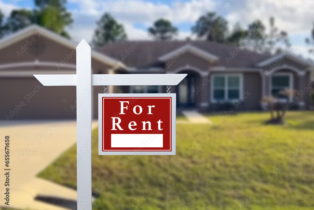 Home for rent. Sign in front of new home. Home for rent. Sign in front of new home.