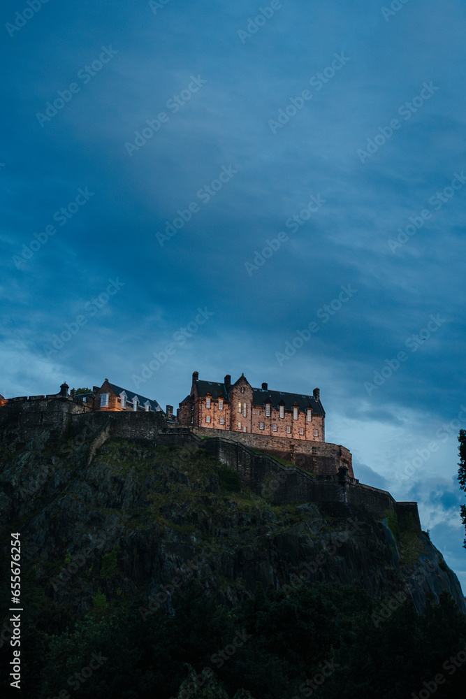 Edinburgh Castle at Night - Medieval Fortress Nestled in Scenic Cityscape with Panoramic Skyline Edinburgh Castle at Night - Medieval Fortress Nestled in Scenic Cityscape with Panoramic Skyline