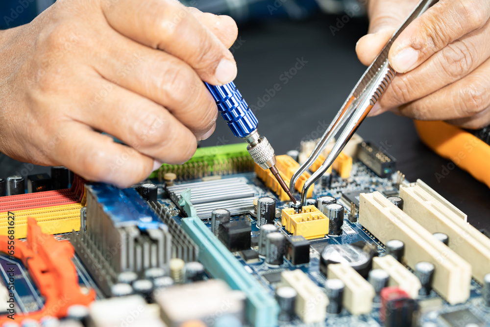 Repairing and upgrade circuit mainboard of notebook, electronic, computer hardware and technology concept. Repairing and upgrade circuit mainboard of notebook, electronic, computer hardware and technology concept.