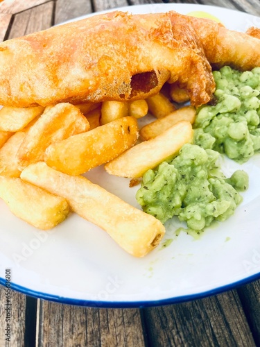 Traditional style fish, chips and mushy peas