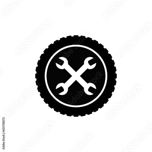 Car wheel and crossed wrenches. Car service and repair.
