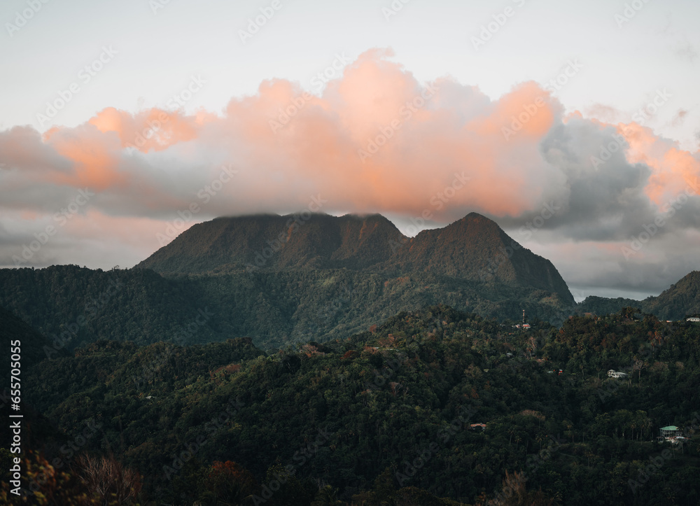 A view of the mountains from Petit and Gros Piton on St. Lucia in the Caribbean under blue skies. Photo taken near Soufriere.