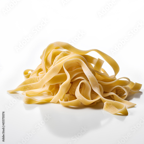 Raw fettuccine pasta isolated on white background as package design element.