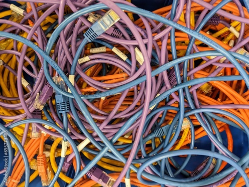 Wallpaper Mural A tangle of different coloured CAT5 network cables Torontodigital.ca