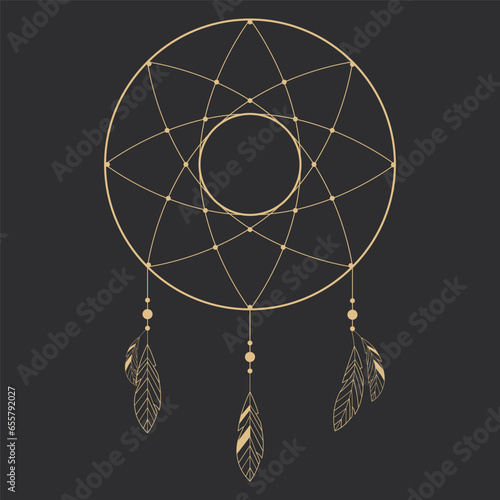 Golden tribal dream catcher native ornament with feathers hanging indian amulet on dark background. 