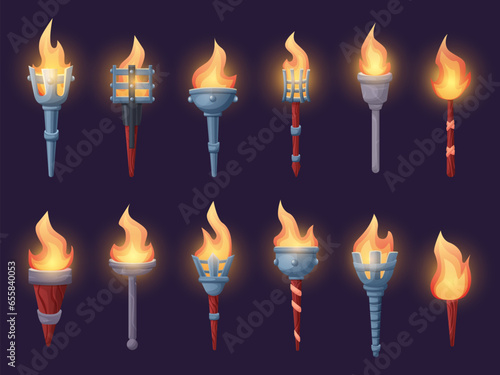Cartoon medieval torches. Magic torch with fire flame and wooden handle. Ancient burning gaming torchlights for castle and adventure nowaday vector set