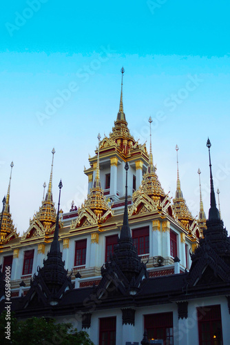 Wat Ratchanatdaram Worawihan (Loha Prasat). a Golden metal pragoda illuminated, Bangkok, Thailand.
