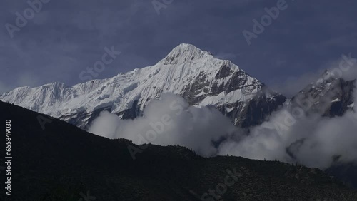 Time lapse of clouds around a Annapurna mountain photo