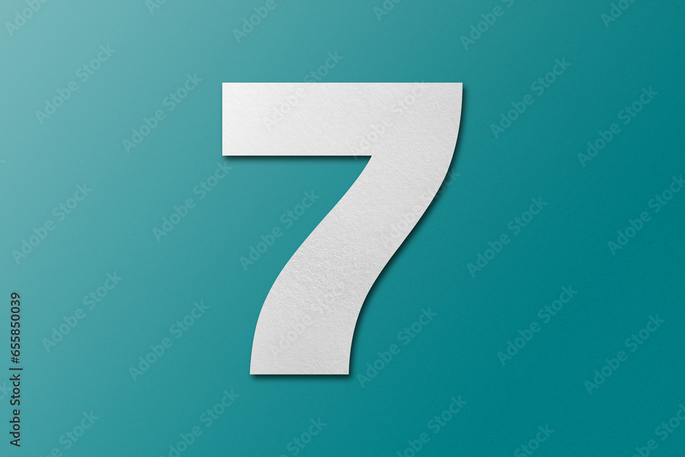 White paper font number 7 isolated on green background. White paper font number 7 isolated on green background.