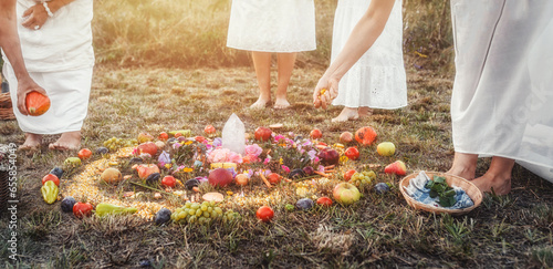 Madala with flowers and fruits, spiritual ceremony of earth. photo