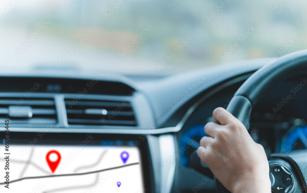 female hands, holding a steering wheel, car, driving a delivery, using a navigation device, through an online app, pinning goals, checking routes, practicing driving, testing, accident insurance.