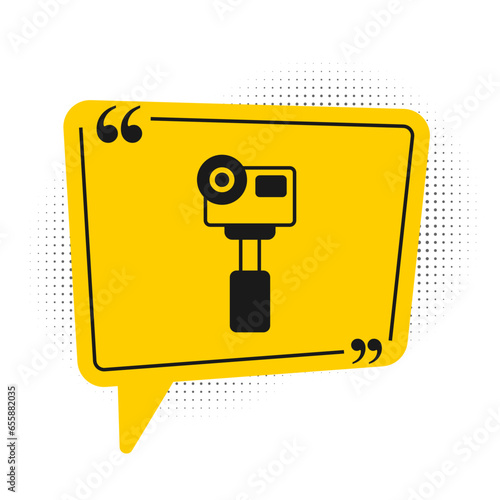 Black Action extreme camera icon isolated on white background. Video camera equipment for filming extreme sports. Yellow speech bubble symbol. Vector