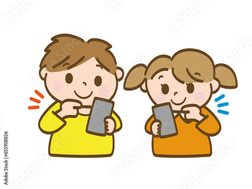 スマホ操作で遊ぶ男の子と女の子_小学生低学年_幼児