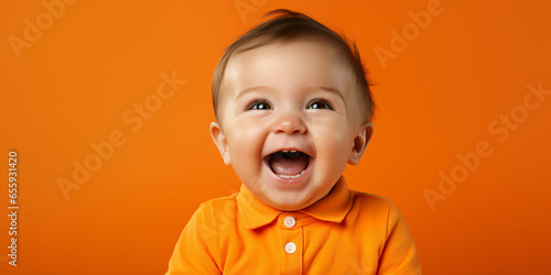 baby on an orange background, newborn, 
