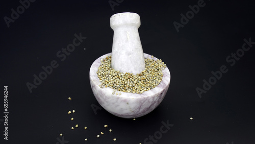 Heap of Pearl millet grain whole for indian gujarati food recipe photo