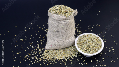 Heap of Pearl millet grain whole for indian gujarati food recipe photo