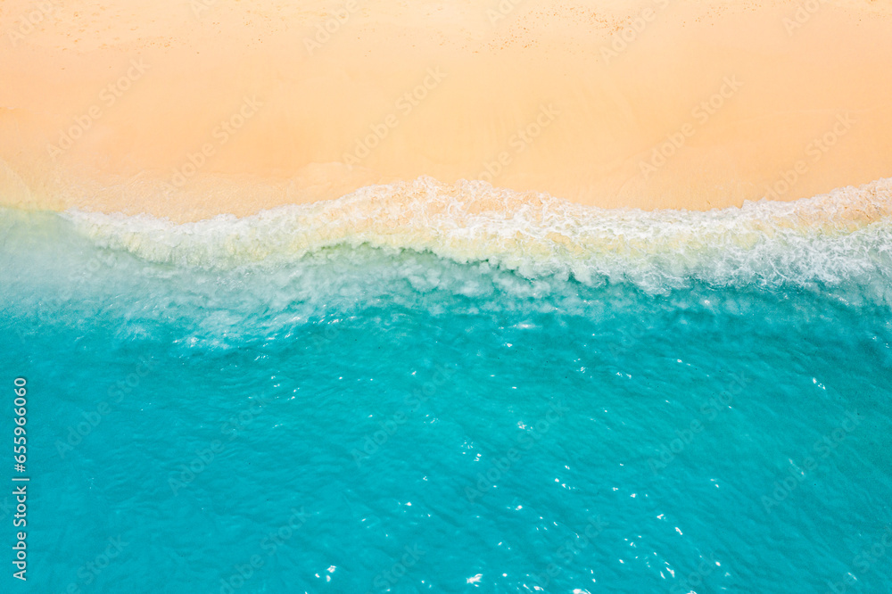 Top drone view fantastic popular travel landscape. Summer seascape blue water yellow sand. Aerial amazing tropical nature background. Beautiful  mediterranean bright sea waves crash beach sunlight