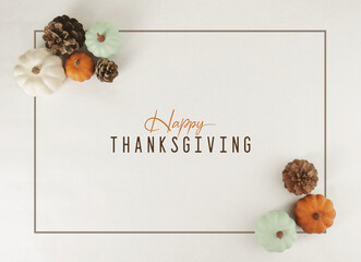 Happy Thanksgiving greeting background with flat lay of pumpkins in frame with modern minimalism style.