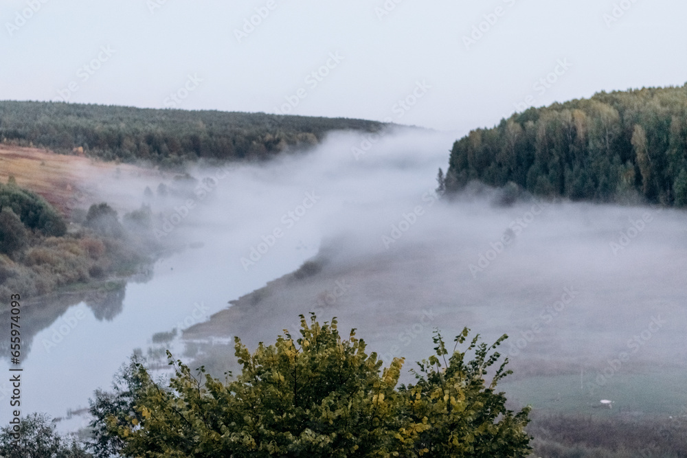 Autumn landscape.Forest and river with fog. Autumn landscape.Forest and river with fog.