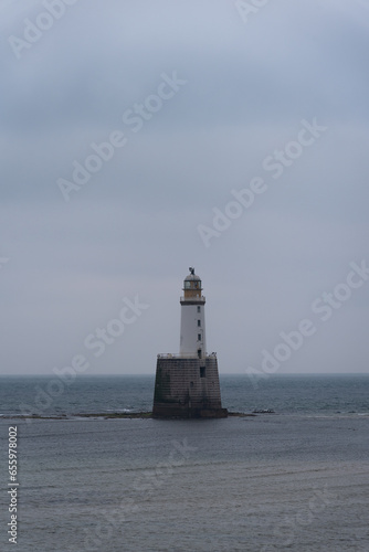 Rattray Head lighthouse in scottish highlands. North coast 500. Calm coastline with nobody. 