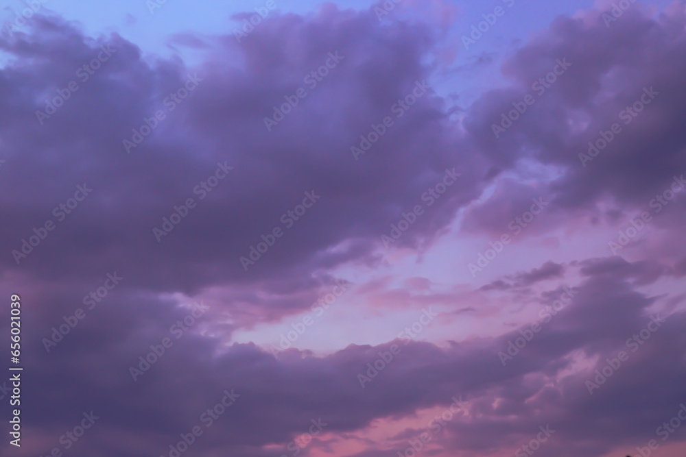 Dark sky with blue clouds at sunset. Evening sky background, dramatic sky landscape