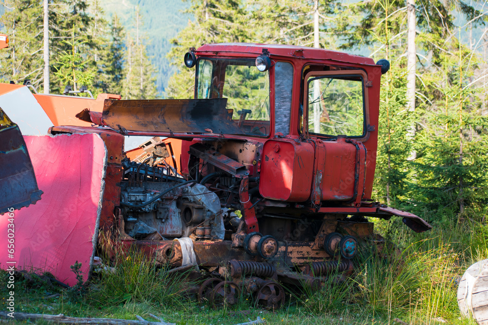 Fototapeta premium old abandoned tractor. broken tractor