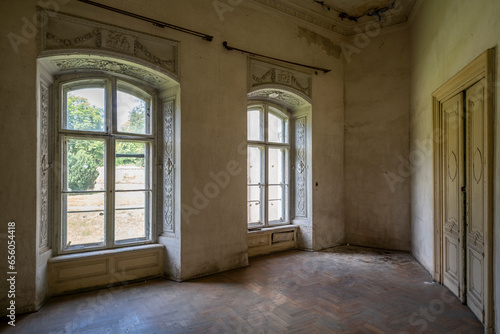Haunted Abandoned Baroque-Classical Palace: A Spine-Tingling Tale of Eerie Elegance and Ghostly Grandeur © Arkadiusz
