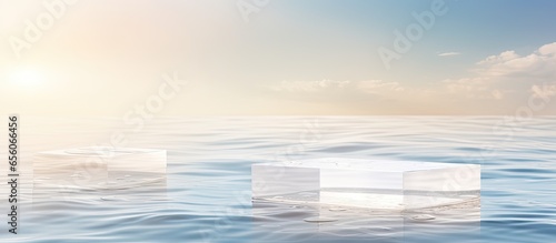 Empty clear square podiums on calm water with splashes and waves in sunlight Background for product presentation Flat lay cosmetic mockup