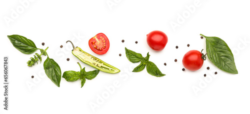 Fototapeta Naklejka Na Ścianę i Meble -  Fresh basil, cherry tomatoes and peppercorn on white background