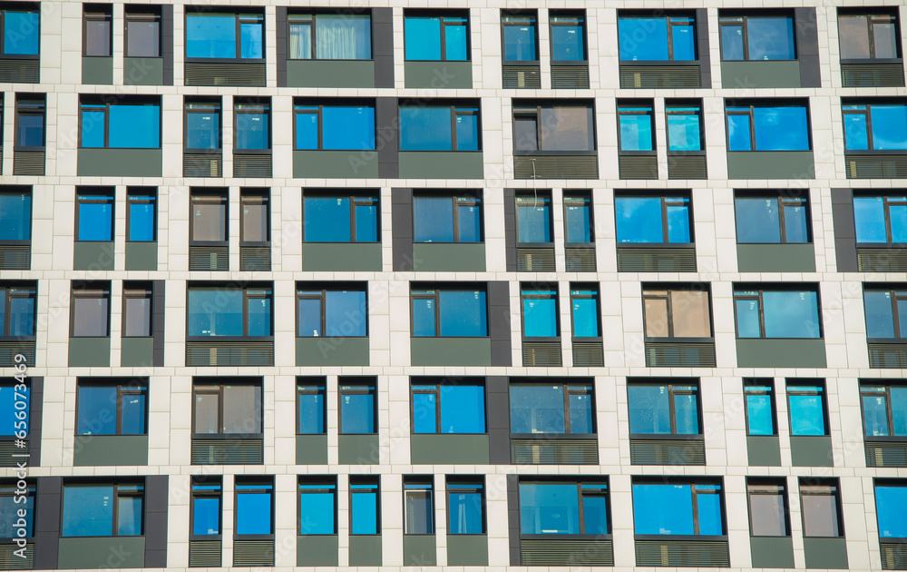 fragment of the facade of a modern building with windows fragment of the facade of a modern building with windows