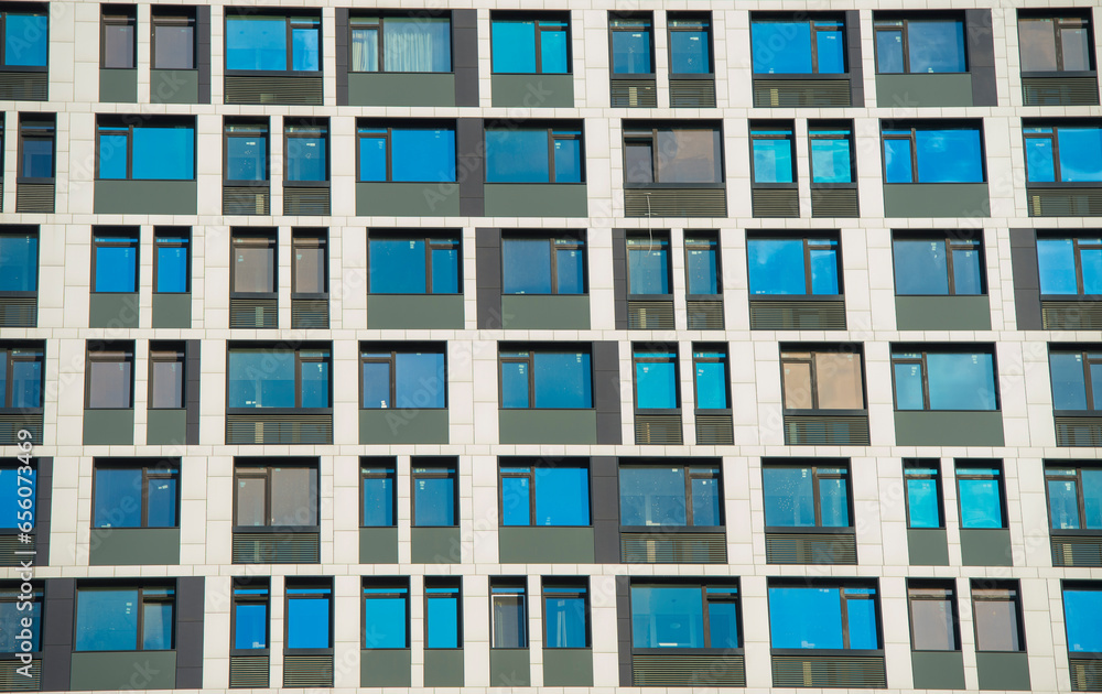 fragment of the facade of a modern building with windows