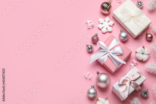Composition with gifts and Christmas decor on pink background © Pixel-Shot