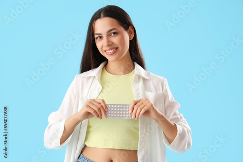 Young woman with contracept...
