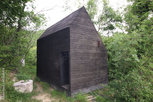Obraz na płótnie black wooden house on the mountains among nature in Botticino in Brescia in Italy
w salonie