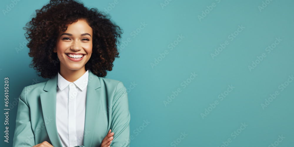 happy, smiling young woman, against a blue background - obrazy, fototapety, plakaty 