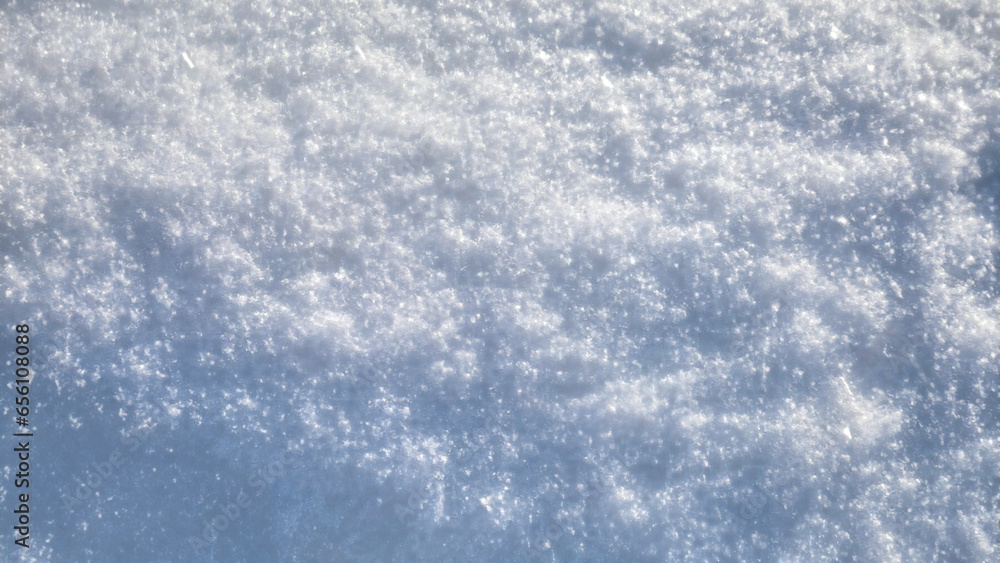 Obraz premium Fresh white snow texture top view. Perfection shining pure snowy background.