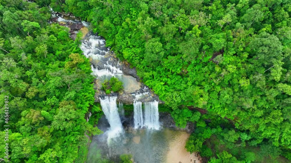 A breathtaking waterfall nestled within a vibrant, emerald tropical jungle. Nature's masterpiece of cascading water and lush greenery. Huai Luang Waterfall, Phu Chong Na Yoi national park, Thailand.
A breathtaking waterfall nestled within a vibrant, emerald tropical jungle. Nature's masterpiece of cascading water and lush greenery. Huai Luang Waterfall, Phu Chong Na Yoi national park, Thailand.