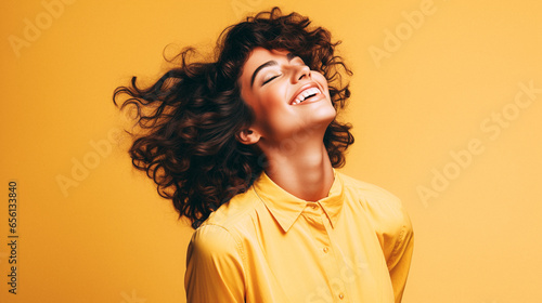 Happy woman dancing isolated on pastel studio background