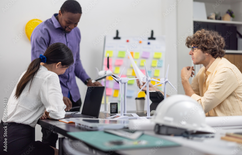 Fototapeta premium Startup team creates portable wind turbine prototype, matching user demand aim for investor funding