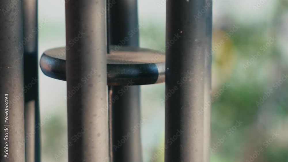 Wind chimes close up moving in the wind Wind chimes close up moving in the wind