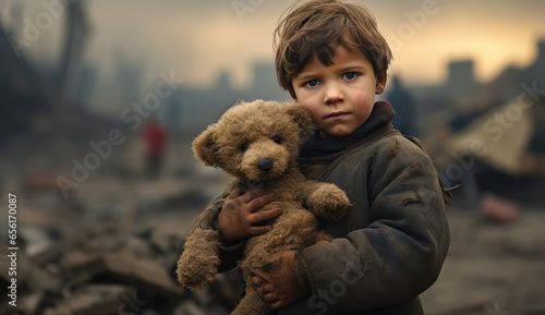 a young boy is holding a teddy bear, humanity's struggle, victims of earthquakes, wars, and natural disasters