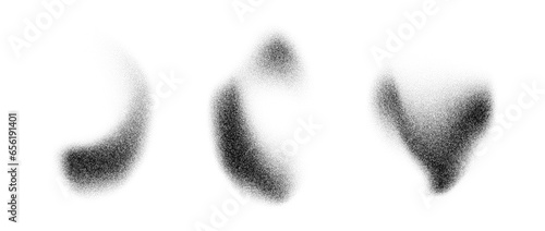 Abstract dotted smudge elements. Noise grain stippled gradient stains set. Black and white textured spray and sand dust spots. Halftone splatter forms collection. Vector dot work splash shapes pack