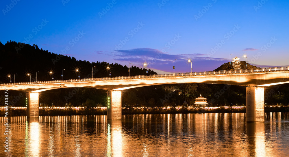 Night view of Jialing River Bridge in Langzhong City