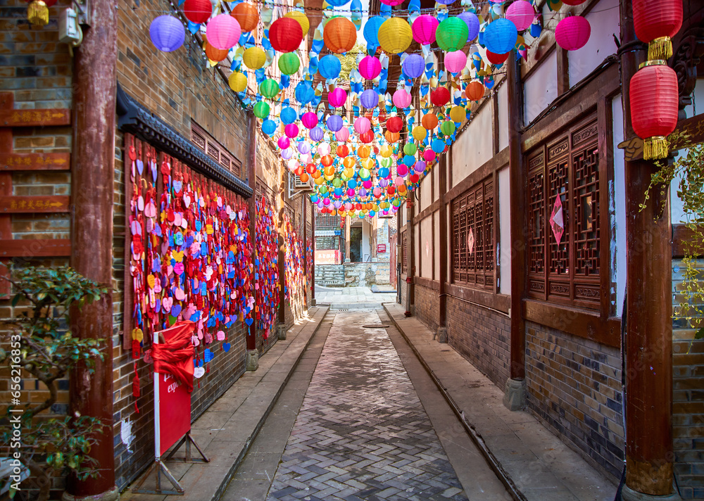 Fototapeta premium An alley full of lanterns in the ancient city of Langzhong, Sichuan, China