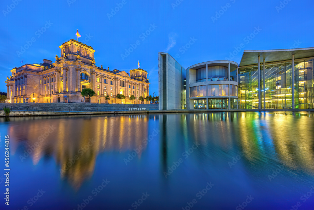 The Reichstag and the Paul-Loebe-Haus at the river Spree in Berlin at dawn